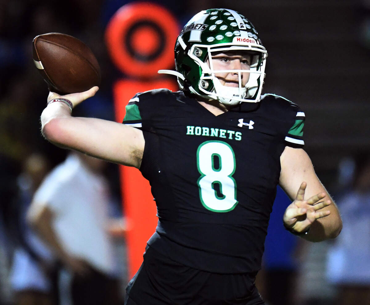 Azle quarterback Chris Lee thorws down the field agaisnt Brewer in the second quarter of their district 3-5A Division 1 football game Friday, October 22, 2021 at Hornet Stadium in Azle, Texas. Special/Bob Haynes
