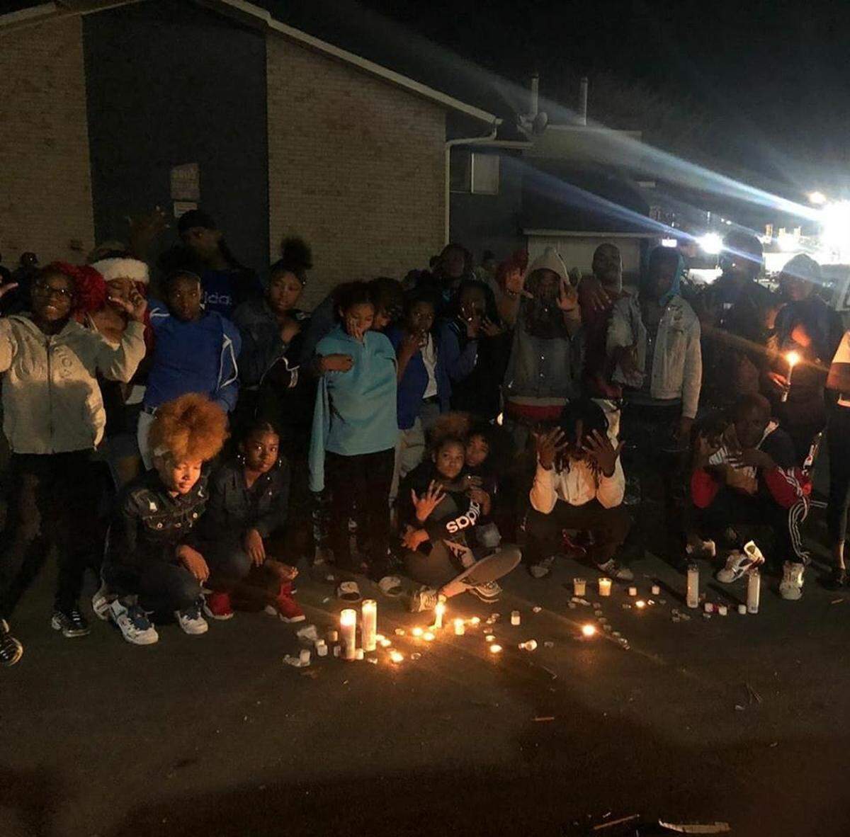 Dozens of friends of Javarus Jackson gather Tuesday night in an apartment complex off Las Vegas Trail to honor him with a vigil. Jackson was found dead with multiple gunshot wounds Saturday behind an abandoned gas station in east Fort Worth and loved ones have been mourning him.