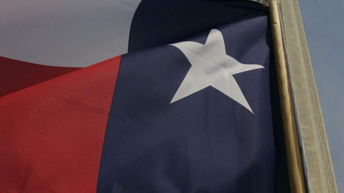 A Texas flag flies outside the San Jacinto Monument in La Porte, Texas. (AP Photo/Pat Sullivan)