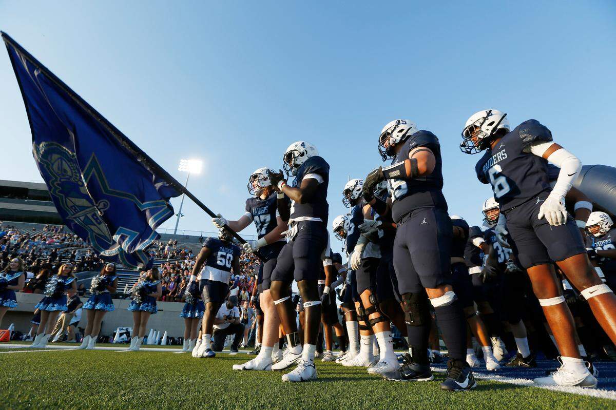 L.D. Bell Raiders are about to take the field before their UIL football game Friday night at Pennington Field in Hurst on Friday Sept. 6, 2024.