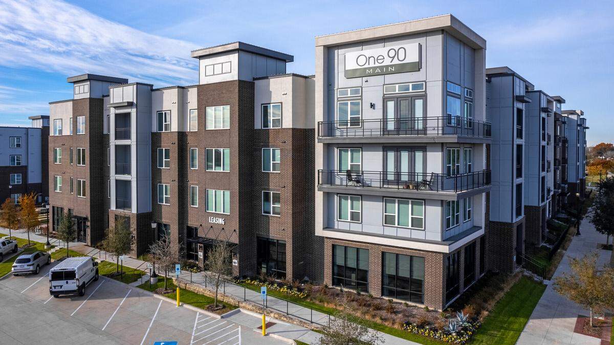 The exterior of One90 Main, an apartment community in Rowlett, Texas. The building’s developer, Integrated Real Estate Group, plans to build another complex with similar styling near Benbrook Lake.