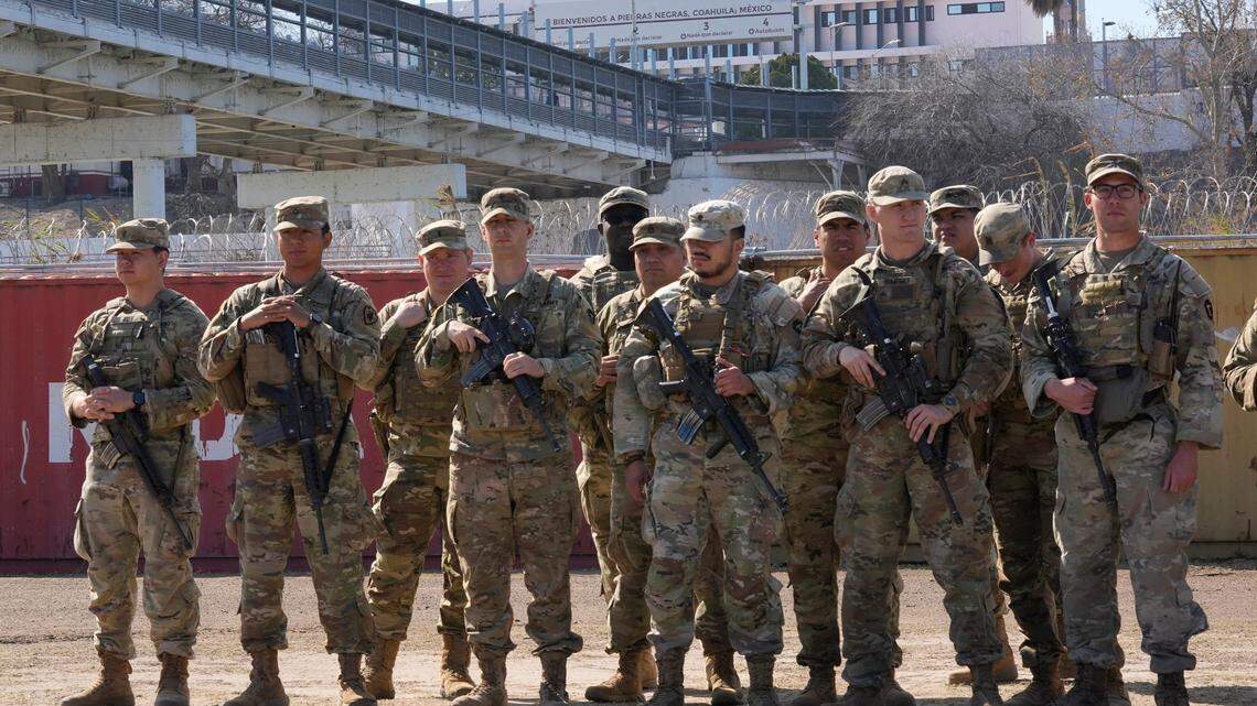 National Guard troops attend a news conference with Gov. Greg Abbott and several state governors in Shelby Park in Eagle Pass on Sunday February 4, 2024.