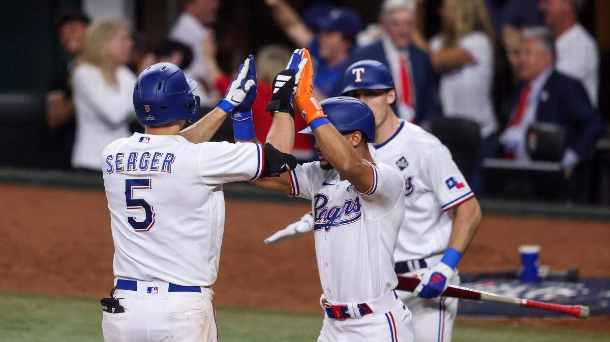 Texas Rangers short stop Corey Seagar celebrates a two-run home run in the bottom of the ninth inning to tie the game during Game 1 of the World Series against the Arizona Diamondbacks on Friday, October 27, 2023, at Globe Life Field in Arlington.