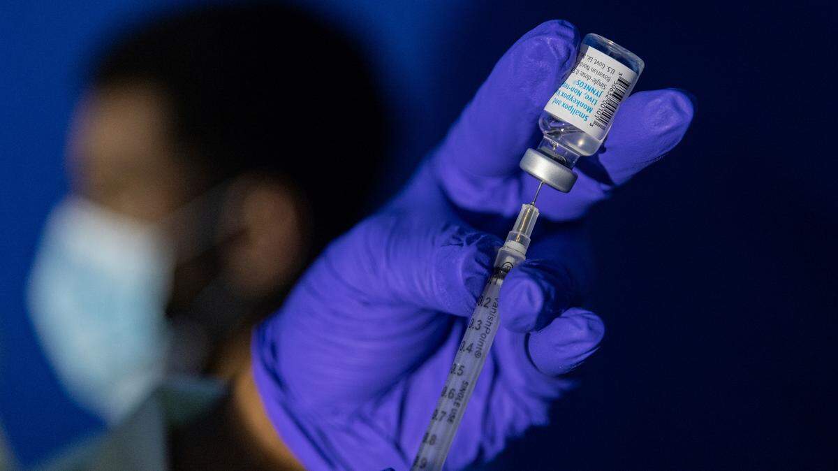 Family nurse practitioner Carol Ramsubhag-Carela prepares a syringe with the monkeypox vaccine before inoculating a patient at a vaccinations site on Aug. 30, 2022, in the Brooklyn borough of New York. A person who studies or works at Arlington Heights High School in Fort Worth has tested positive for monkeypox, the Fort Worth Independent School District said on Friday.