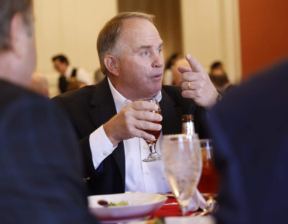 Former TCU head football coach Gary Patterson talks with guests at his table during the Exchange Club Christmas luncheon for Children's Charities on Wednesday Dec. 03, 2025 at The Fort Worth Club in Fort Worth, Texas.