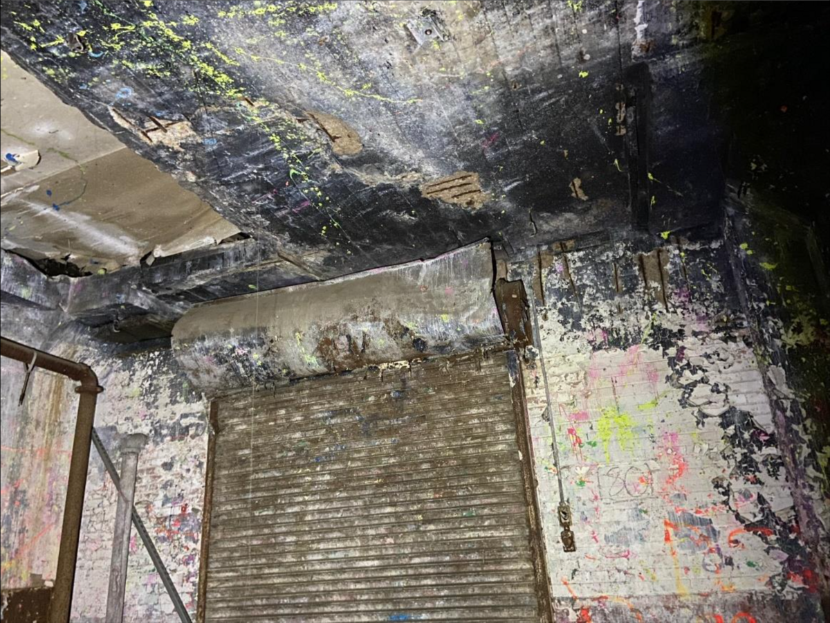 Spalled concrete on the second level of the T&P Warehouse was a common condition in several locations of the floor, according to an engineer’s report.
