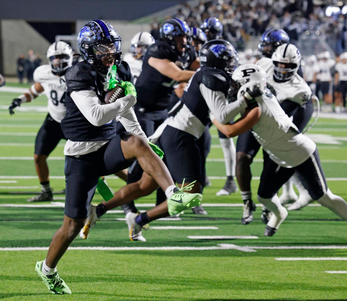 North Crowley running back Daniel Bray (5) high steps into the end zone during a UIL Class 6A D1 Area Round football playoff football game at Crowley ISD Multi-Purpose Stadium in Fort Worth, Texas, Friday, Nov. 22, 2024.