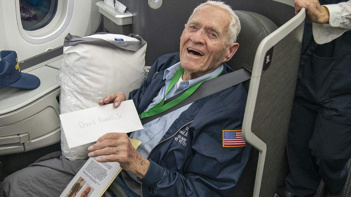 World War II veteran David Russell Jr. proudly shows a letter of appreciation written to him by a Keller ISD student as part a project called WW II Mail Call.