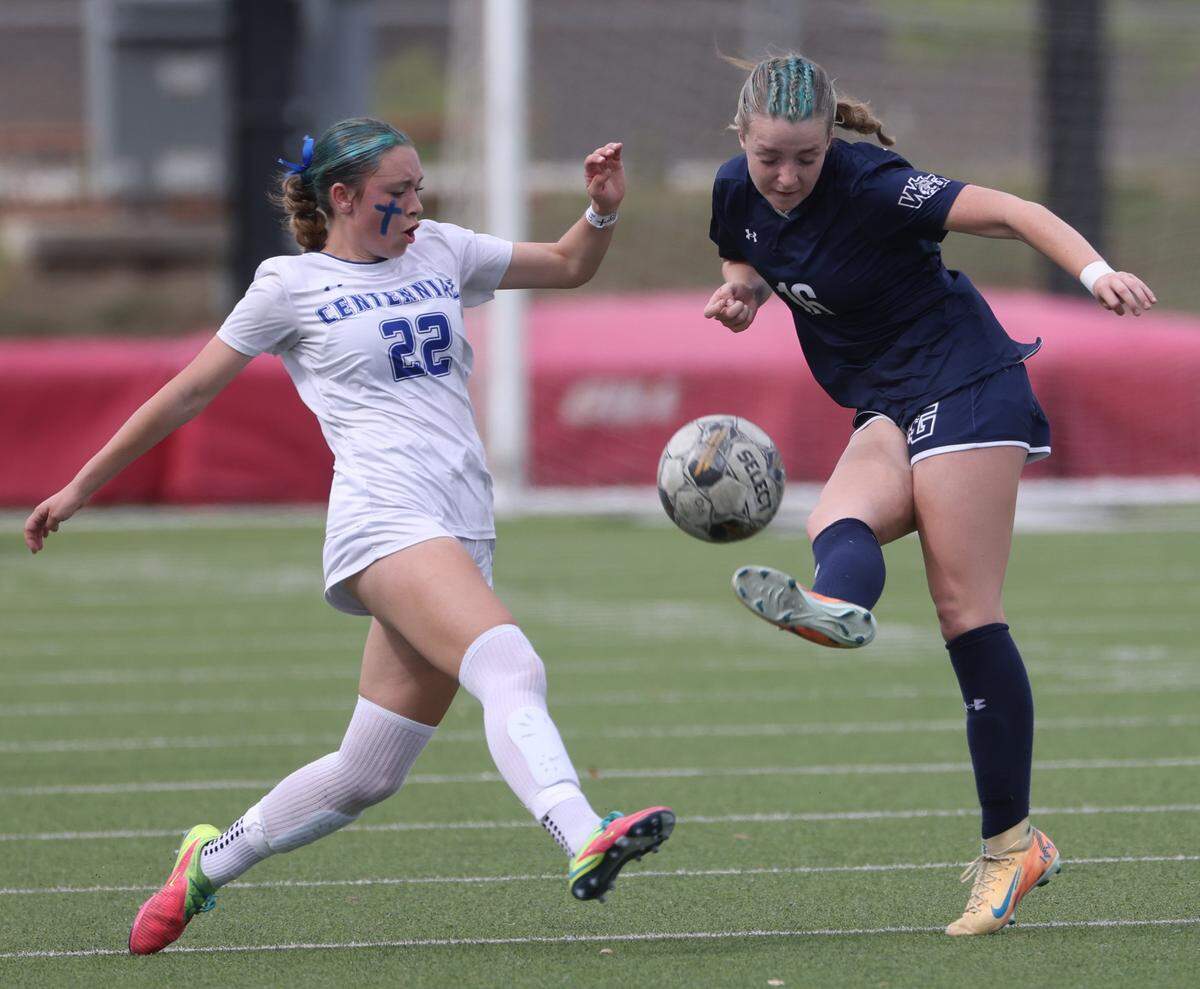 Prosper Walnut Grove forward Maya Nohr (16) kicks the ball in front of Burleson Centennial defender Charlie Watson (22) during the second half of a UIL Conference 5A Division I state semifinal soccer game at Keller ISD Athletic Complex in Keller, Tx. Friday, April 03, 2026.