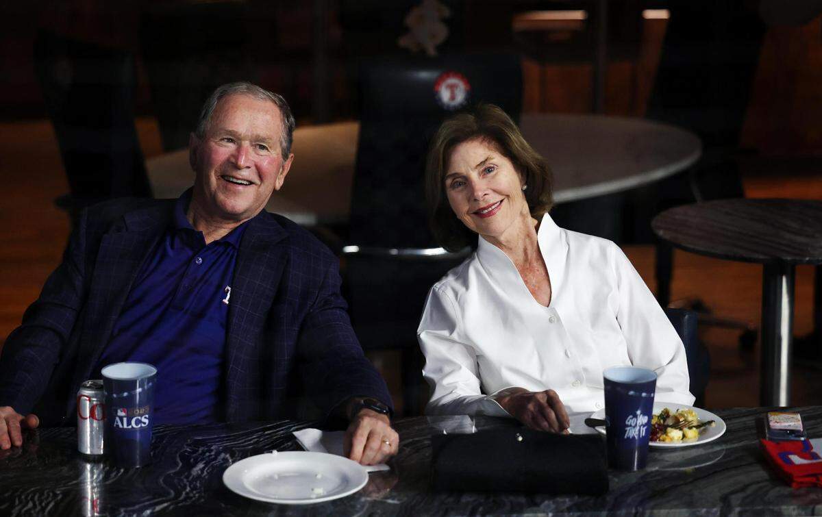 President George W. Bush and wife, Laura Bush, attend Game 3 of the American League Championship Series between the Texas Rangers and Houston Astros at Globe Life Field in Arlington on Wednesday, October 18, 2023.