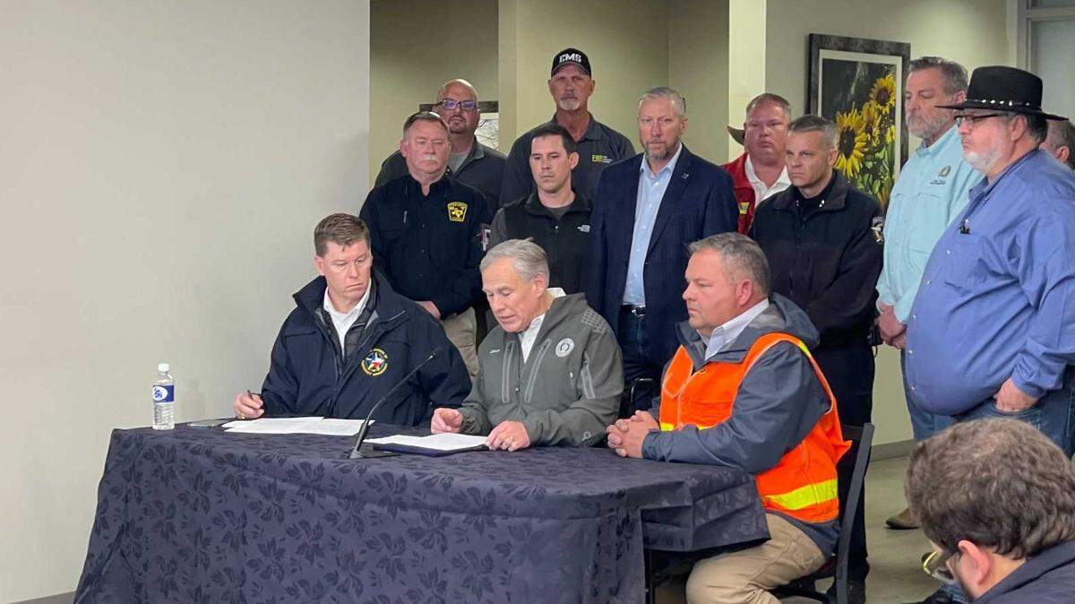 Gov. Greg Abbott signs a disaster declaration for 16 Texas counties on Tuesday, following Monday’s heavy rain, hail and deadly tornadoes.