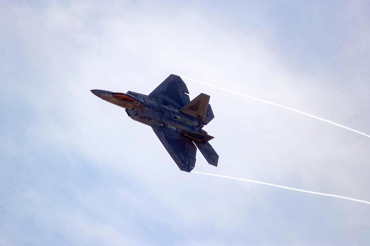 A Raptor F-22 performs aerial maneuvers during the AllianceTexas Aviation Expo presented by Bell at the Fort Worth Alliance Airport in Fort Worth on Saturday, Oct. 22, 2022. The F-22 can fly backwards and leads as the highest performing aircraft in the U.S. Air Force.