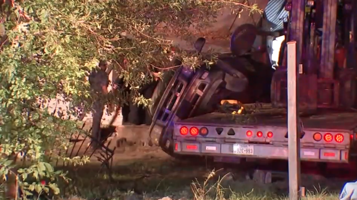 A woman was killed early Tuesday morning when an 18-wheeler truck crashed into a mobile home, police say.