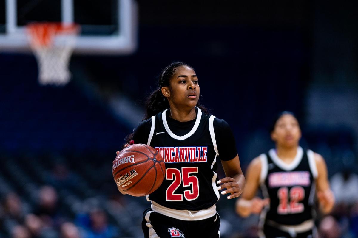 Deja Kelly (25) dribbles down the court watching for an opening during the 1st half of the 6A State Championship game between Duncanville and Cypress Creek at the Alamodome in San Antonio on March 7th, 2020. (Matt Smith: Special to the Star-Telegram).