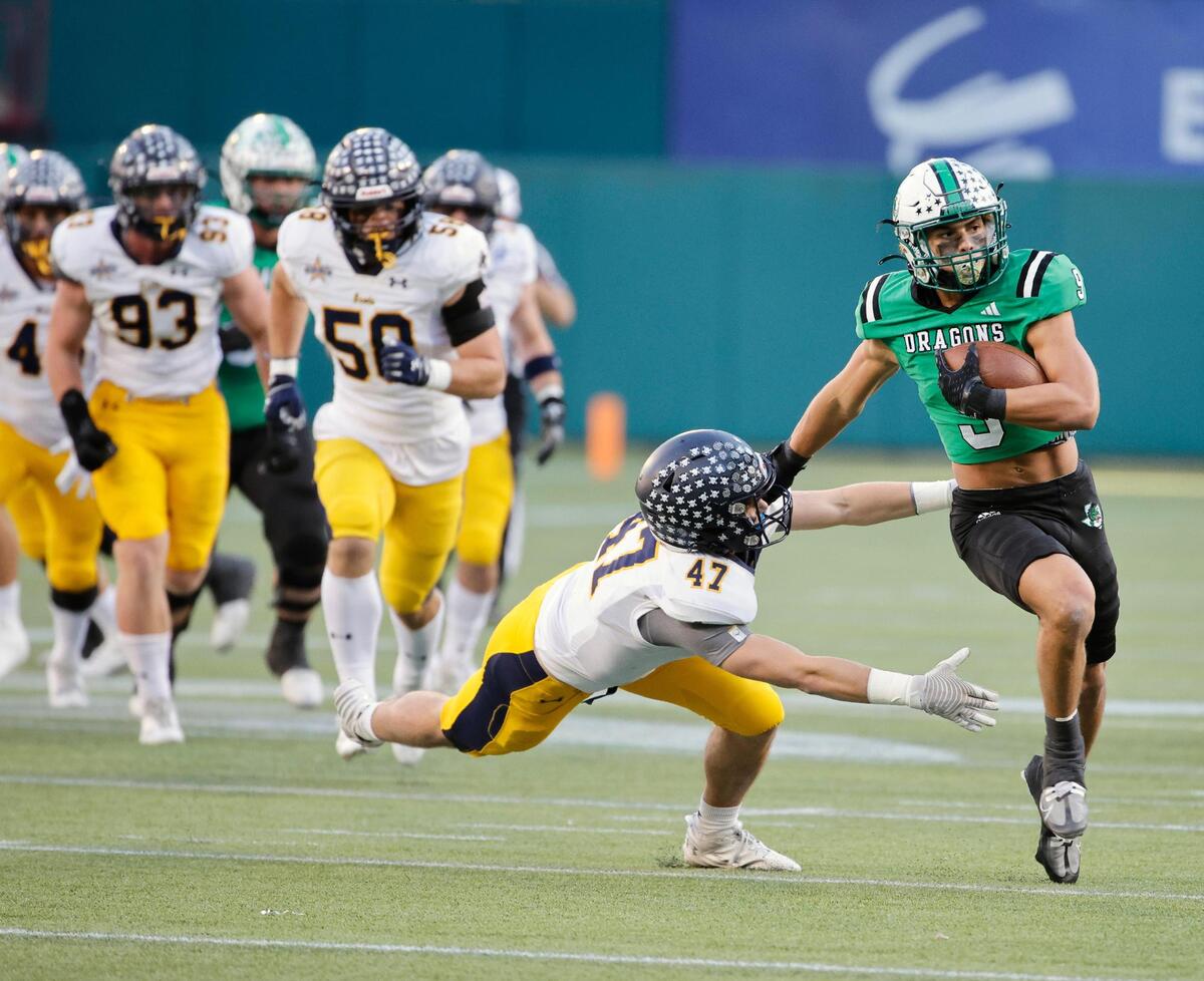 Carroll running back Riley Wormley (9) outruns the Highland Park defense in the first half of a UIL Conference 6A Division 2 region football playoff game at Choctaw Stadium in Arlington, Texas, Friday, Nov. 24, 2023.