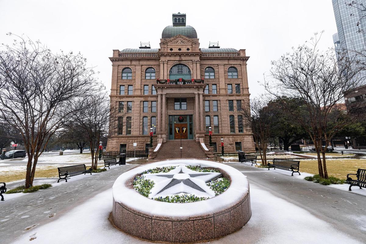 The Tarrant County Courthouse is covered in a coating of snow in downtown Fort Worth on Thursday, Jan. 9, 2025.