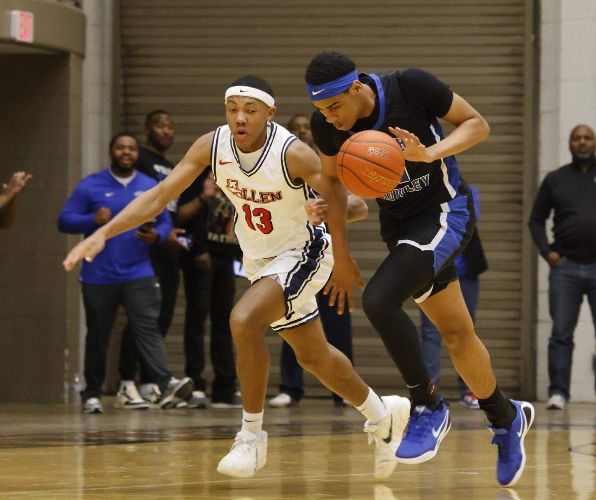North Crowley wing Trey Hall (11) pushes ahead of Allen's Bennett Mosley (13) during the first half of a UIL Class 6A Division I boys regional final basketball game at Thomas Coliseum in Haltom City, Texas, on Friday, March 6, 2026.
