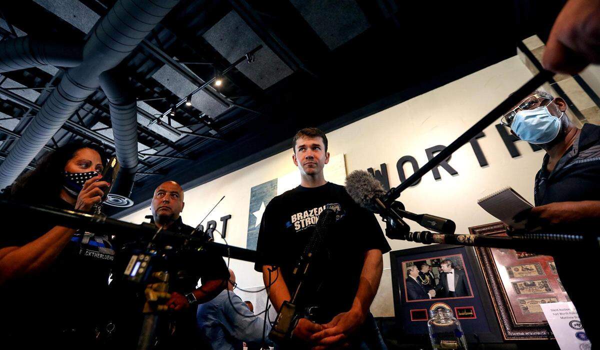 Jared Brazeal gives an update on his brother, Officer Matthew Brazeal, at a fundraiser for him at Cafe Republic on Monday, June 29, 2020. Matthew Brazeal, an officer of the Fort Worth Police Department, was struck by a driver fleeing apprehension on June 13, police said. Brazeal is still in the hospital and had his latest surgery on Monday.