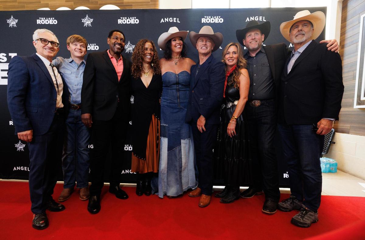 Cast, producers, family and PBR representatives pose for a photograph during the world premiere of “The Last Rodeo” on Monday, May 12, 2025, in Fort Worth.