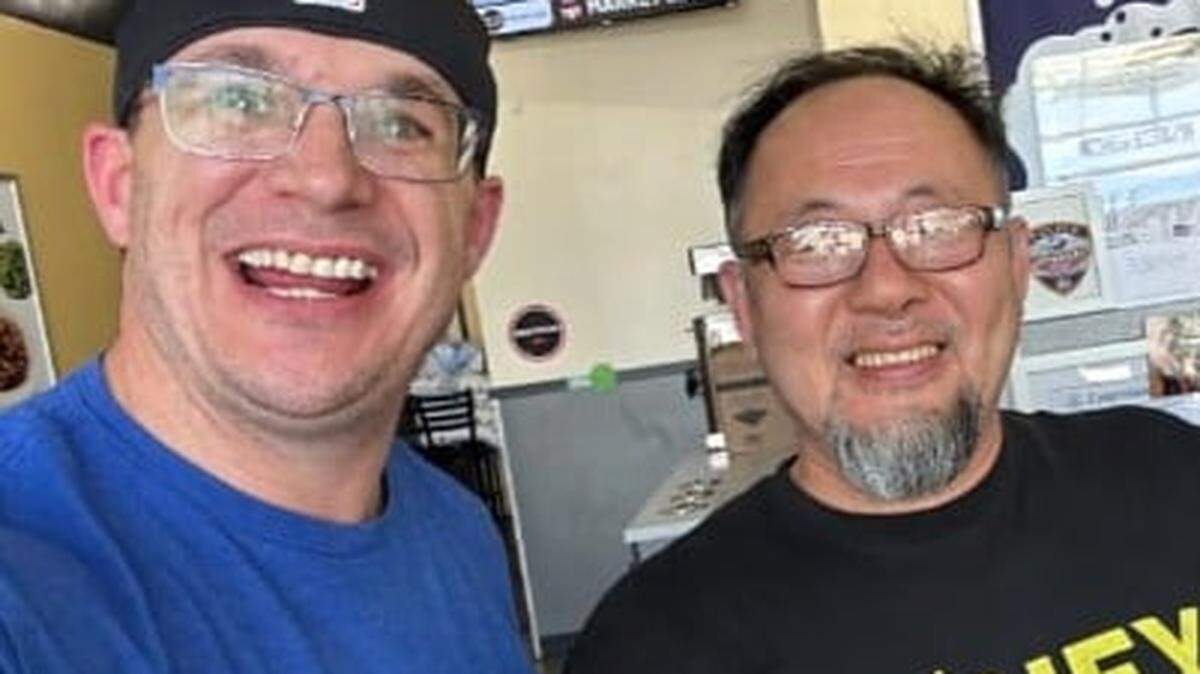 Dr. James Taylor (left) with restaurant owner Scott Choi after Taylor performed his act of charity of leaving an extra $100 after paying his bill. Taylor does this to help others enjoy a nice meal, or to help the server or someone else with financial challenges.