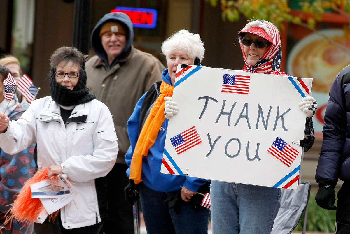 Nov. 11, 2014: Ruby Bressman of Fort Worth watches the annual Veterans Day parade in downtown Fort Worth.