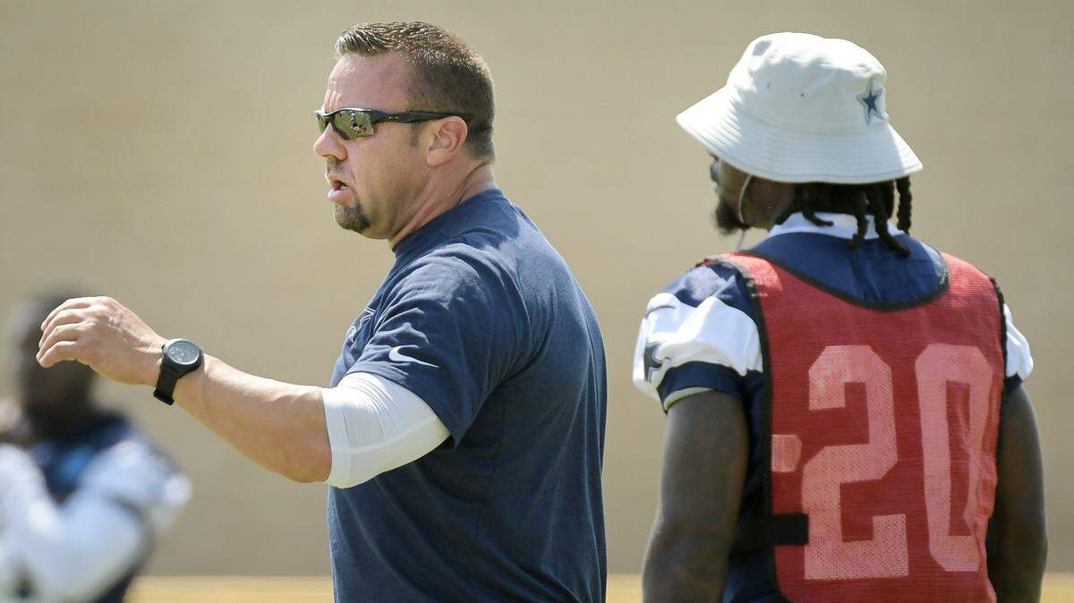 Dallas Cowboys special teams coordinator Keith O’Quinn working with his group during the morning walkthrough at training camp in Oxnard, California, Thursday, Aug. 2, 2018.