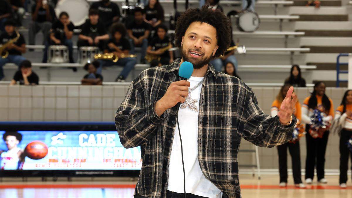 Detroit Pistons point guard Cade Cunningham speaking at Bowie High School during his jersey retirement ceremony on Wednesday, Dec. 17.