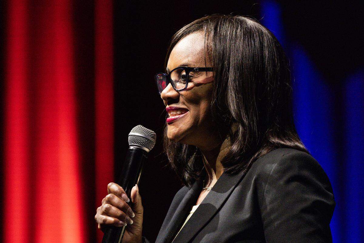 Alisa Simmons, Tarrant County commissioner, Precinct 2, speaks to the capacity crowd on the stage for ‘The People vs. The Power Grab’ rally at the Ridglea Theater in Fort Worth on Saturday, Aug. 9, 2025.