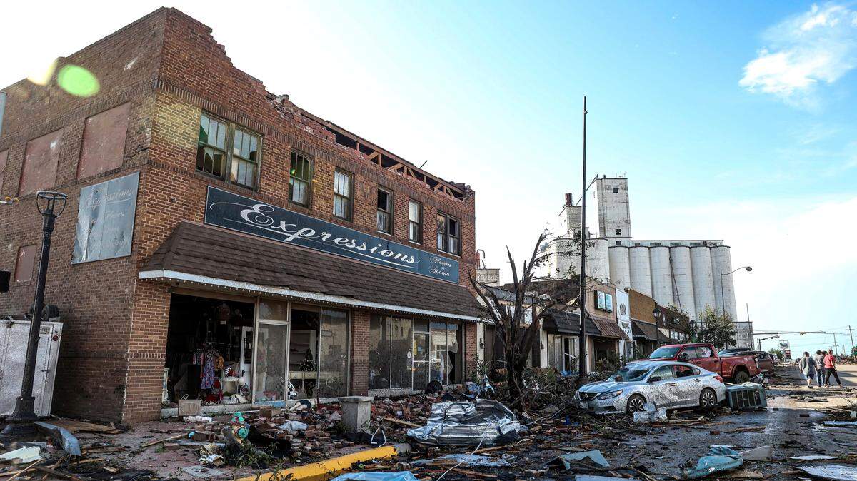 Buildings and vehicles show damage after a tornado struck Perryton on Thursday.
