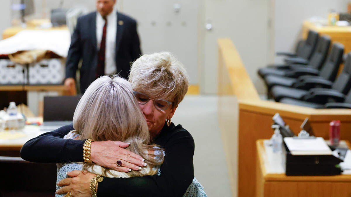 Shanon Dion, back, daughter of alleged victim Doris Gleason, embraces Cheryl Pangburn, daughter of alleged victim Marilyn Bixler, during a recess on the fourth day of the trial of accused serial killer Billy Chemirmir at Frank Crowley Courts Building in Dallas, on Thursday. Chemirmir, 49, is charged with capital murder of 22 elderly people in North Texas. 
