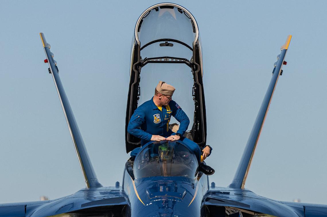 Cdr. Thomas Zimmerman begins to exit his aircraft after landing at the ‘Wings over Cowtown’ Blue Angels airshow media day at the Naval Air Station Joint Reserve Base in Fort Worth on Thursday, April 11, 2024.