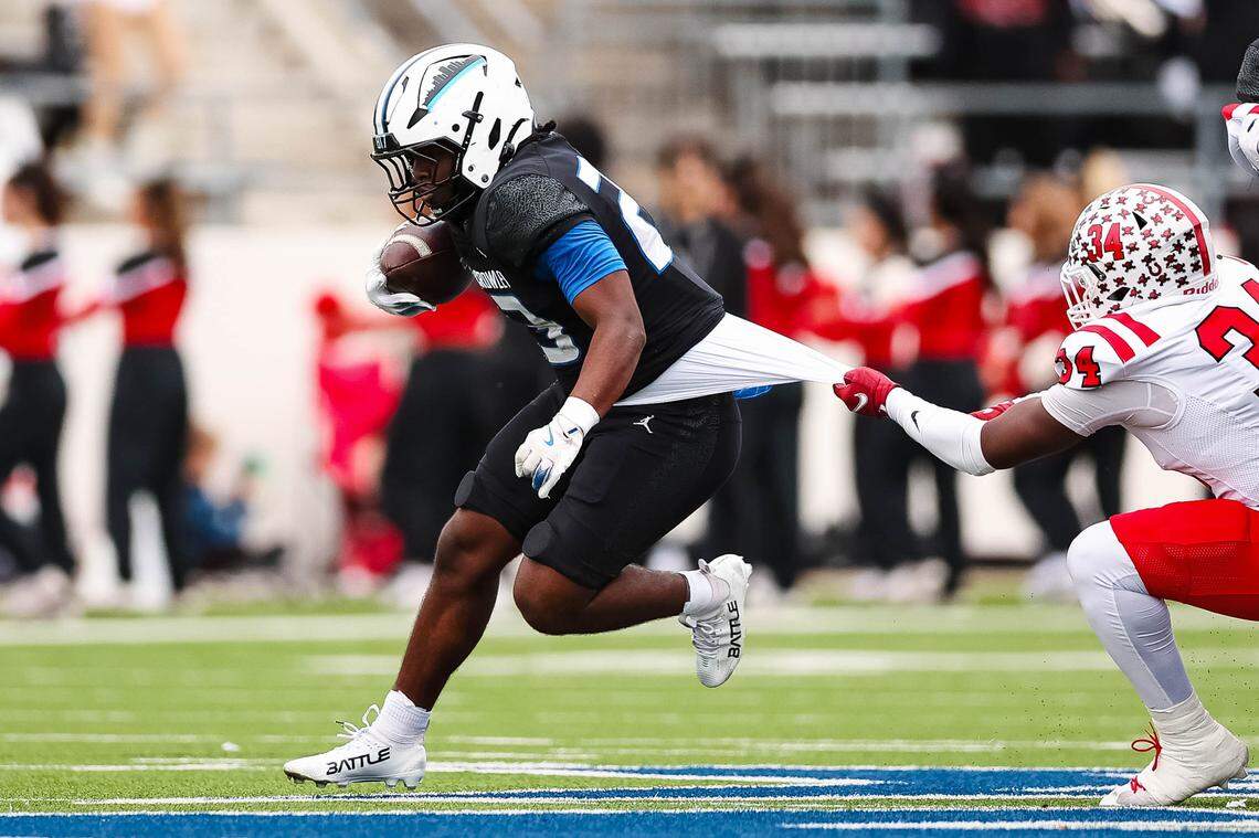 North Crowley running back Kiante Ingram (23) run past a Coppell defender during a Class 6A Division I regional playoff Saturday, Nov. 29, 2025, at Midlothian ISD Stadium in Midlothian.