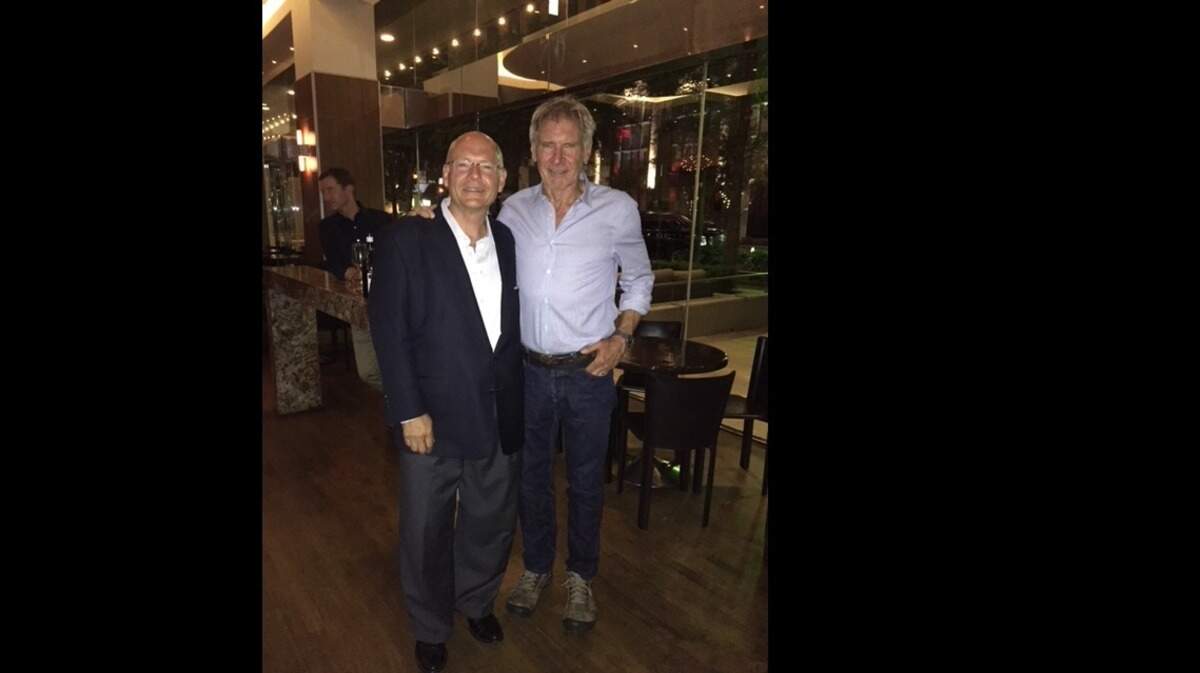 Harrison Ford with Adam Jones, owner of Grace and Little Red Wasp in downtown Fort Worth. Ford usually makes a stop at Grace when he's in Fort Worth.