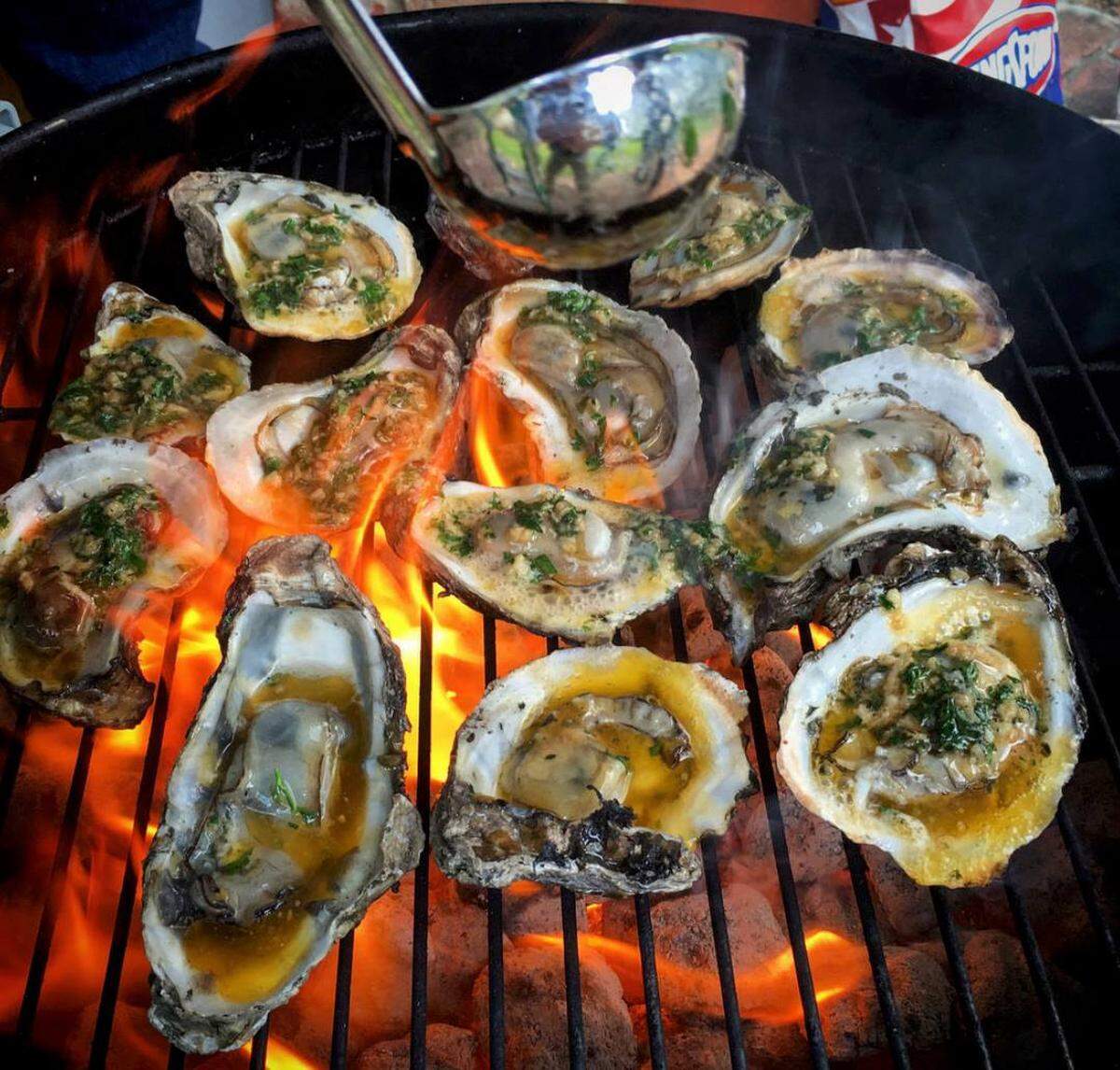 Chargrilled oysters from Bourbon Street Oyster Bar & Grill, which opened in October in Fort Worth’s Montgomery Plaza