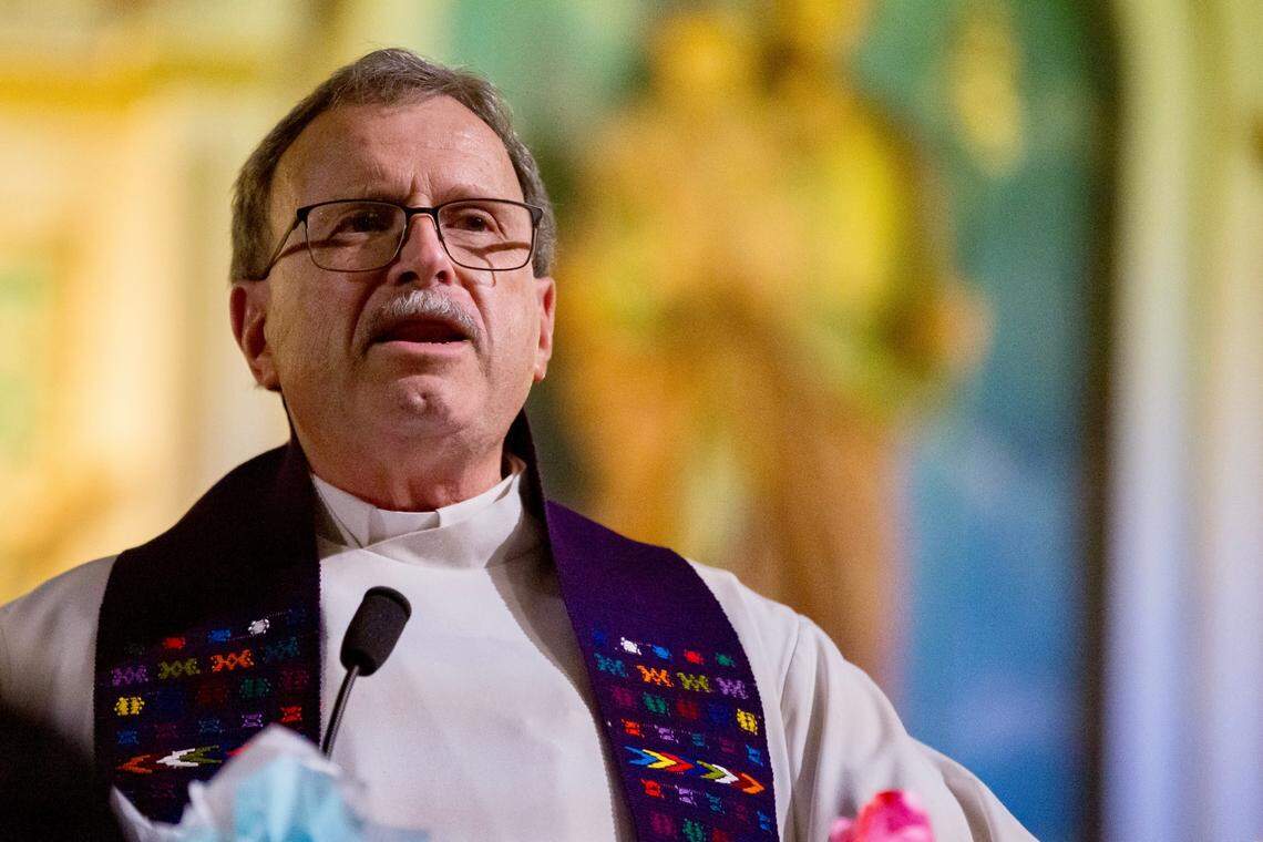 Rev. Rafael Garcia welcomes guests to Sacred Heart Church as they joined Hope Border Institute, Ruben Garcia, director of Annunciation House, and members of diverse religious traditions gathering at San Jacinto on Thursday, March 21, 2024, to march to Sacred Heart Church in downtown El Paso for a vigil for the human dignity of migrants.