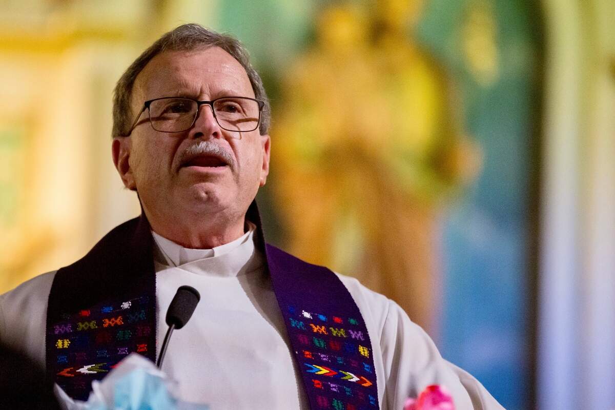 Rev. Rafael Garcia welcomes guests to Sacred Heart Church as they joined Hope Border Institute, Ruben Garcia, director of Annunciation House, and members of diverse religious traditions gathering at San Jacinto on Thursday, March 21, 2024, to march to Sacred Heart Church in downtown El Paso for a vigil for the human dignity of migrants.