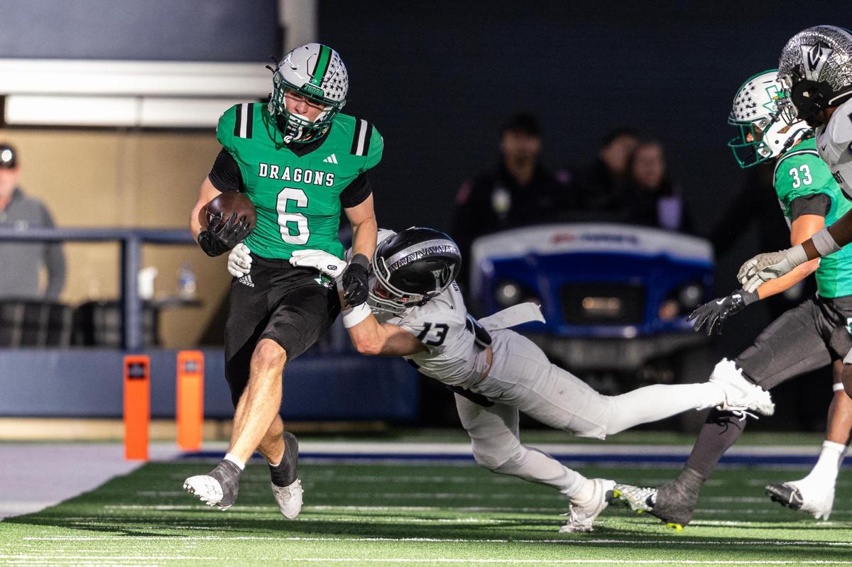 Southlake Carroll punt returner Parker Harris (6) is tackled by Vandegrift defender Gavin Koester (13) on a kick off return in the first half of the UIL 6A Division II championship game at AT&T Stadium in Arlington on Saturday, Dec. 21, 2024.