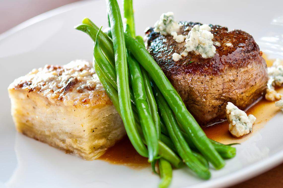 Filet mignon with blue cheese at Cru Food & Wine Bar.