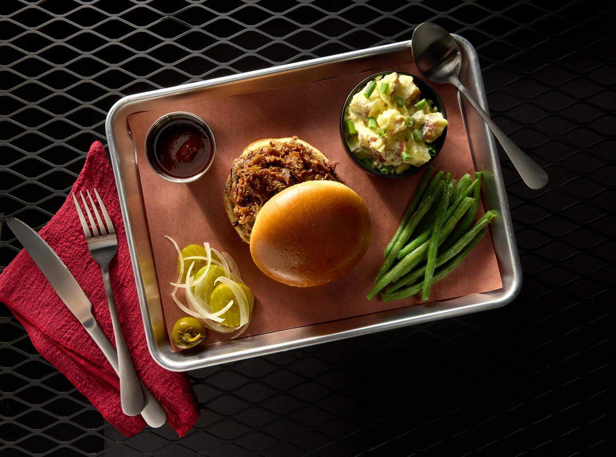 The Pecan Lodge brisket sandwich will be one of the first class meal offerings on flights to select airports out of Dallas-Fort Worth International Airport.