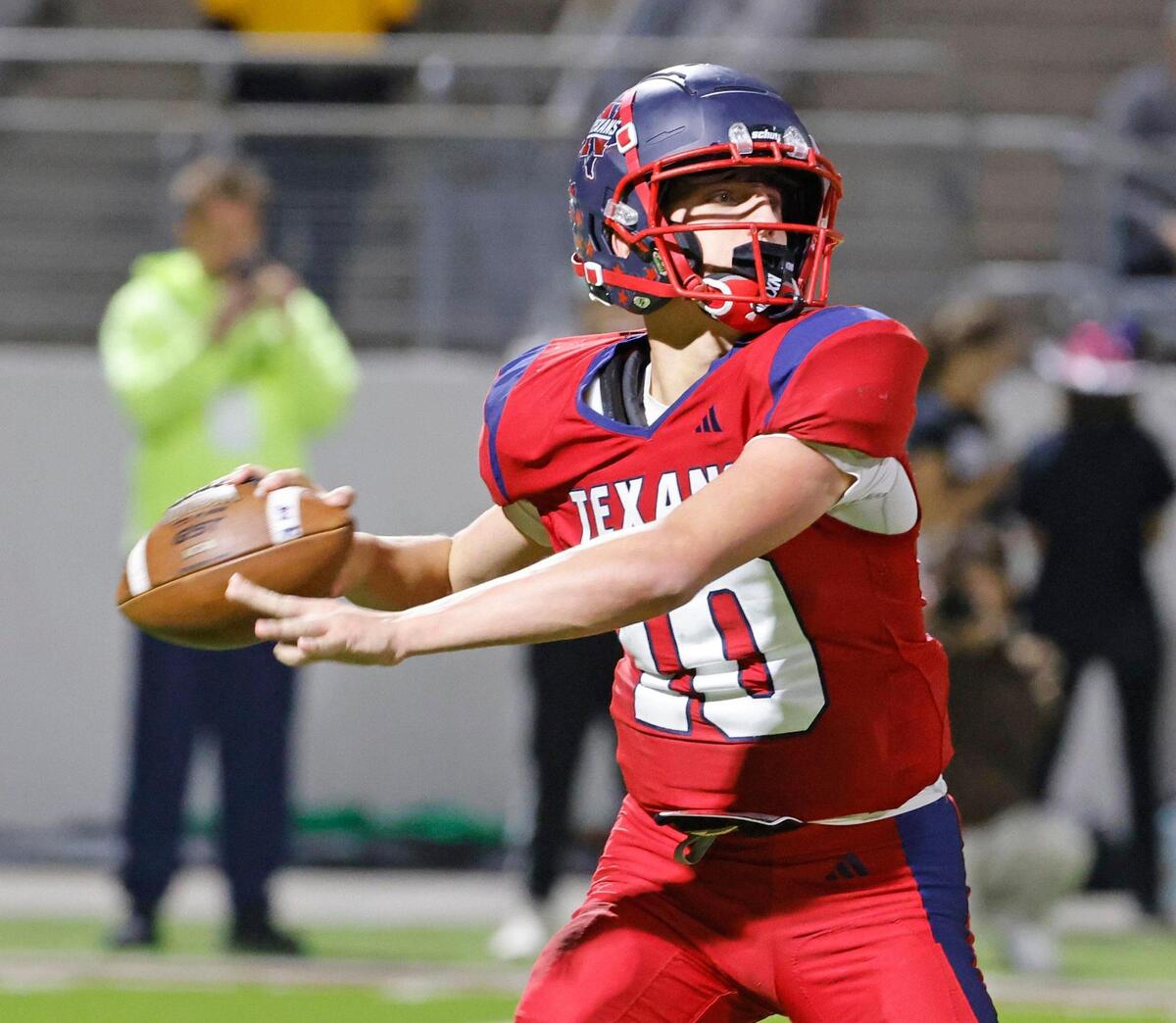 Northwest quarterback Trey Poe (10) launches a completion down field during a District 4 6A football game at Northwest ISD Stadium in Justin, Texas, Thursday, Oct. 17, 2024.