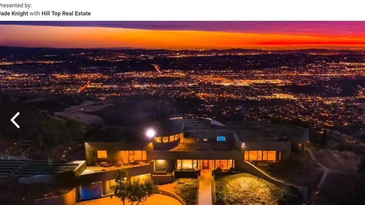 Perched on a mountain side, the Los Angeles mansion offers generous valley views.