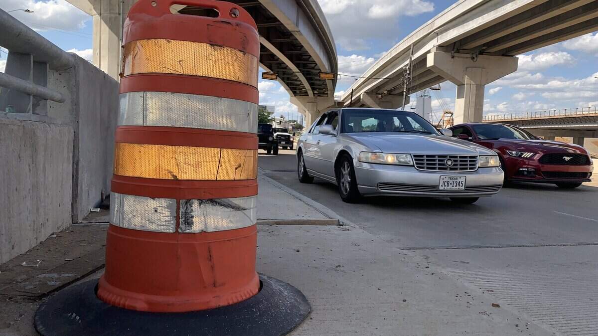 Arlington motorists navigate a southbound I-30 entrance ramp near Ballpark Way.