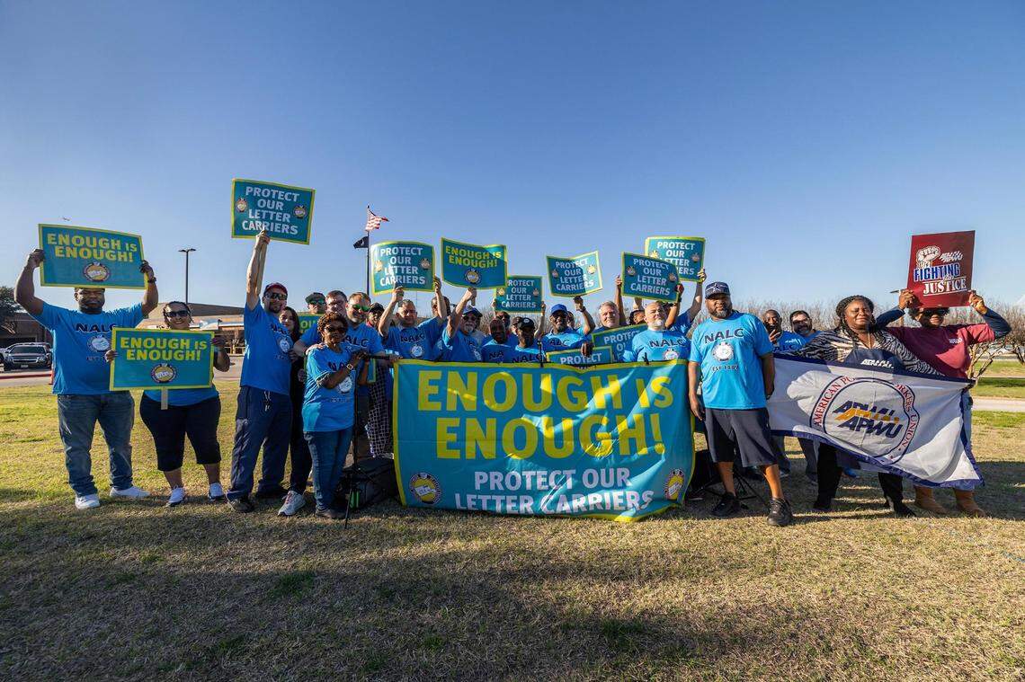 Mail carriers with the National Association of Letter Carriers organize to express their frustrations due to a rise in assaults and robberies against mail carriers in Dallas and Fort Worth during a union rally at the United States Postal Service office in Dallas on Thursday, Feb. 22, 2024.