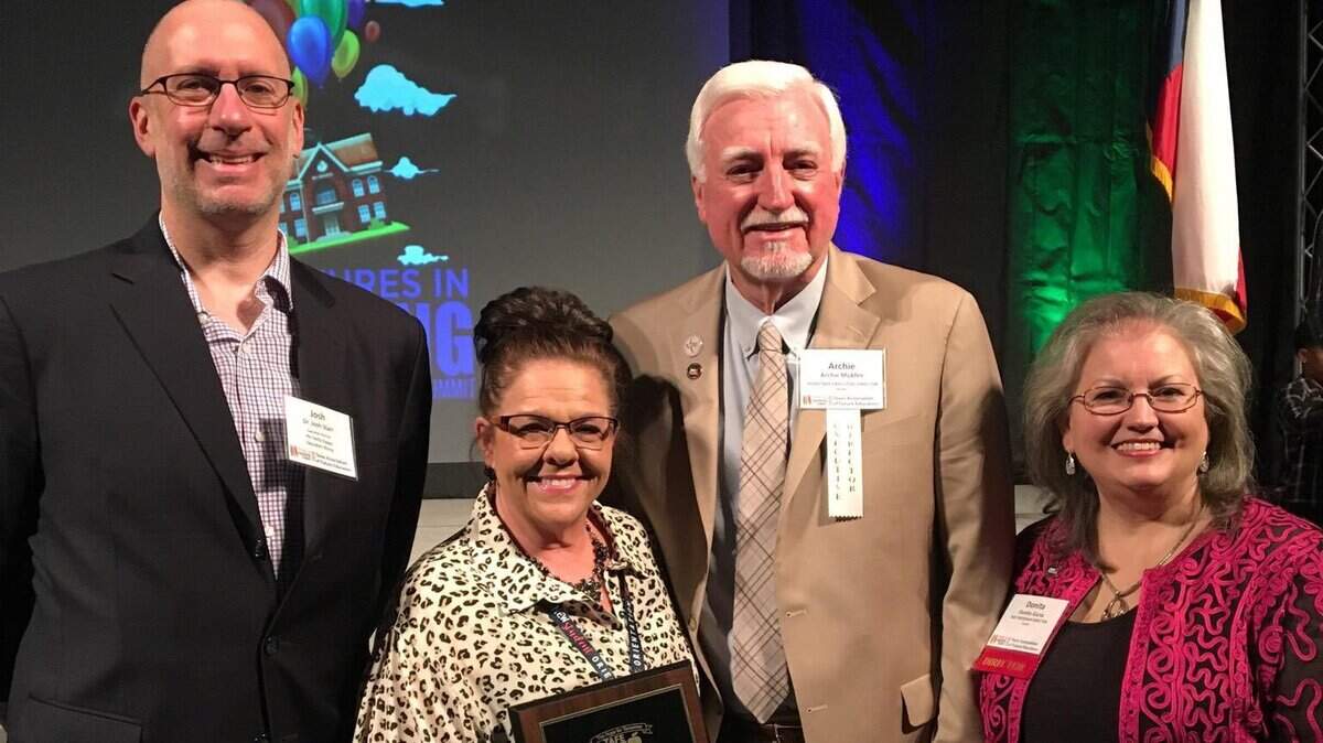 Keller Technical Education Teacher Kim Smith, second from left, recently received the Texas Association of Future Educators State Teacher of the Year Award, the highest award a TAFE adviser can win. With her are, from left, Phi Delta Kappa International CEO Joshua Star, Texas Association of Secondary School Principals Executive Director Archie McAffee, and TAFE State Director Donita Garza.