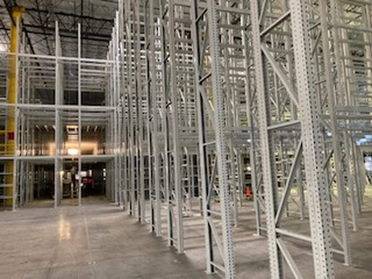 Metal racks stand at Fort Worth Amazon fulfillment center construction site in this photo from a former safety manager. Workers were not bolting and securing each rack during installation, according to a former safety manager and whistleblower.