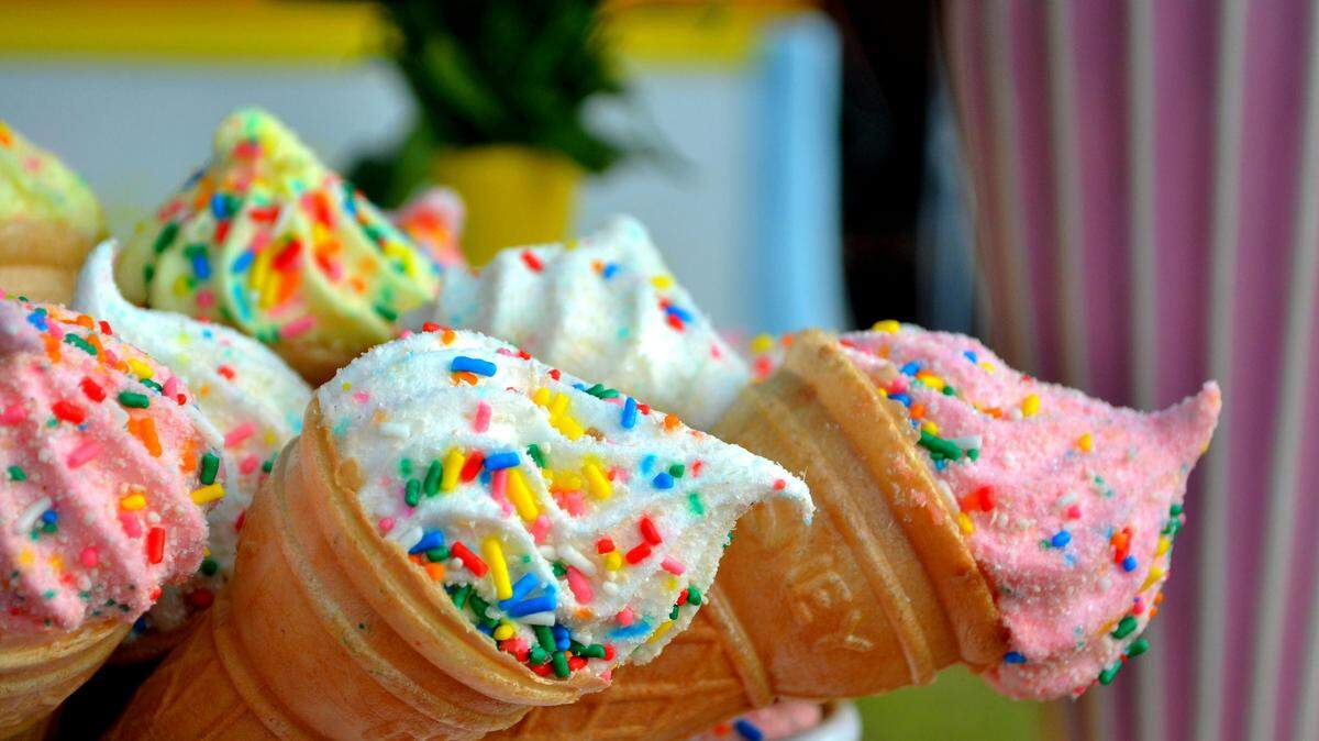 Brown cone with white sprinkled icing.