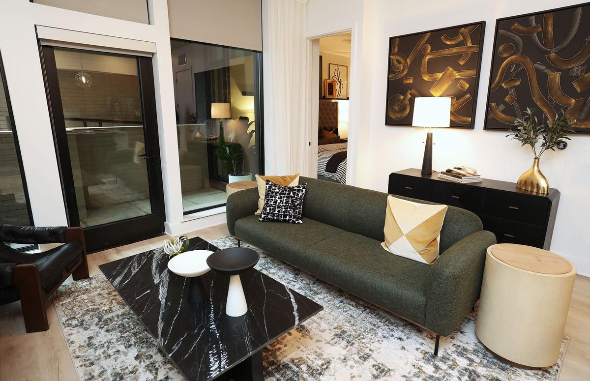 The living area of a Crescent Residences model unit on Wednesday, Sept. 4, 2024. There are 168 units in the luxury apartment complex that is part of the Cultural District’s Crescent development.