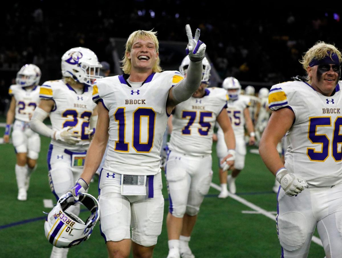 Brock wide receiver Jhett Jones (10) walks off the field with team mates after winning a UIL Class 3A D1 state semifinal football game at the Ford Center in Frisco, Texas, Thursday, Dec. 08, 2022. Brock defeated Malakoff 21-10. (Special to the Star-Telegram Bob Booth)