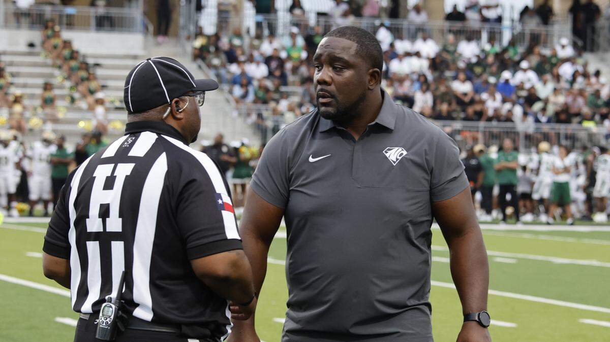 North Crowley head coach Ray Gates talks with an official during the first half of a UIL football game between DeSoto and North Crowley at Crowley ISD Multi-Purpose Stadium in Fort Worth, Texas, Friday, Sept. 05, 2025.