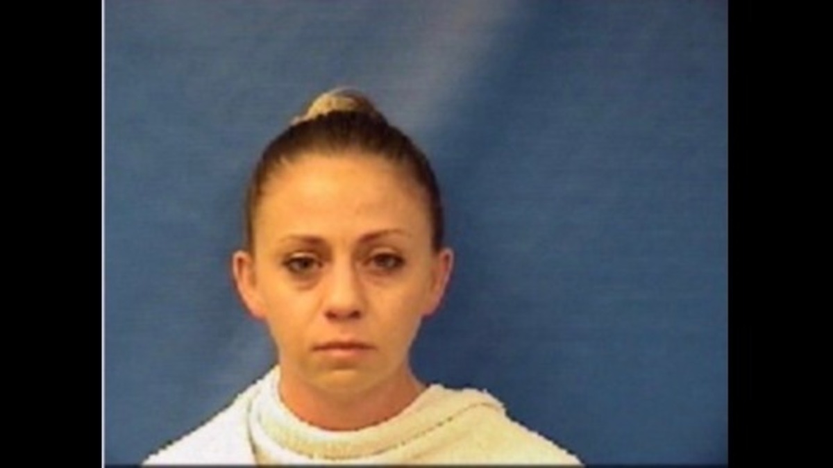 Amber Guyger, 30, a four-year veteran officer for the Dallas Police Department, was arrested and charged with manslaughter in the Sept. 6 shooting death of Botham Jean in Dallas.
